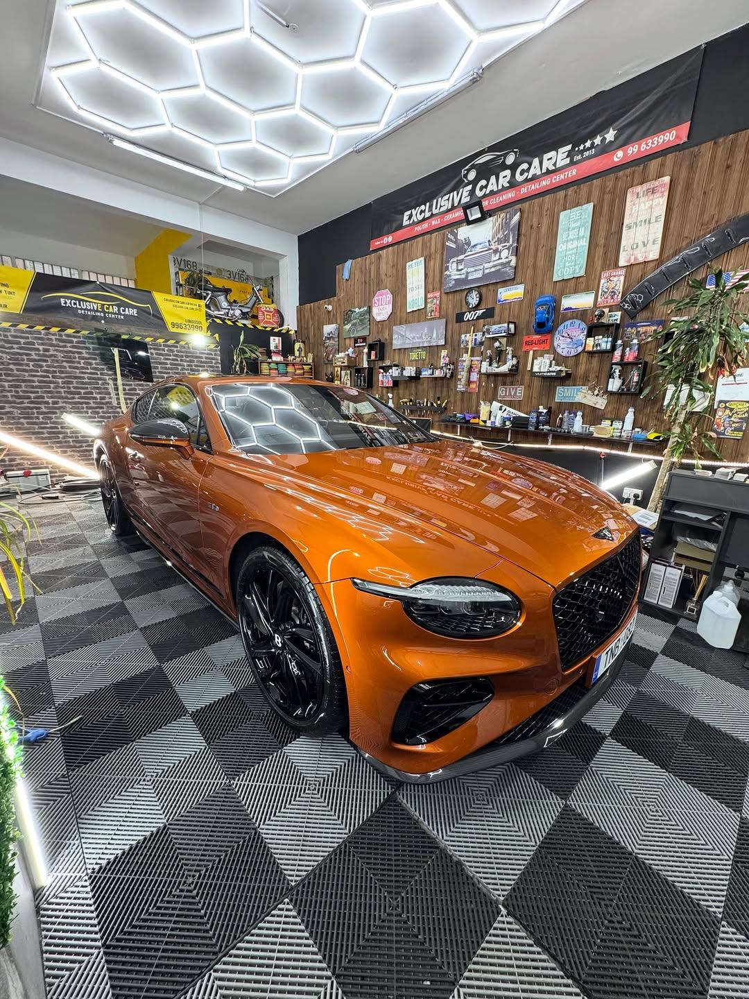 Orange Bentley Continental GT First Edition wrapped in paint protection film at Exclusive Car Care Limassol